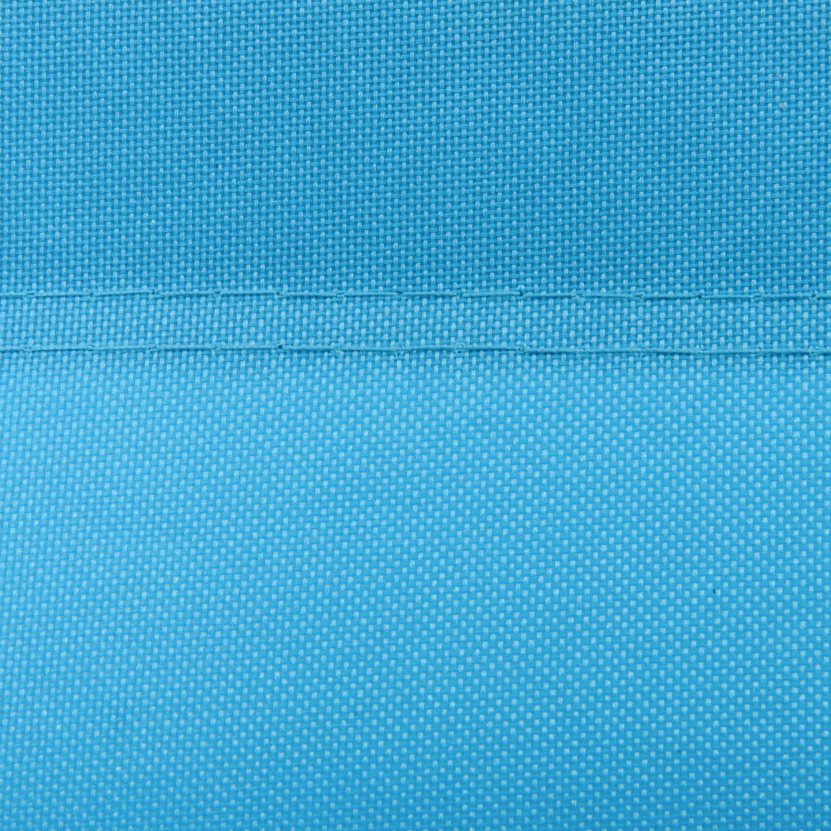 Close-up of the lounger’s blue woven fabric.