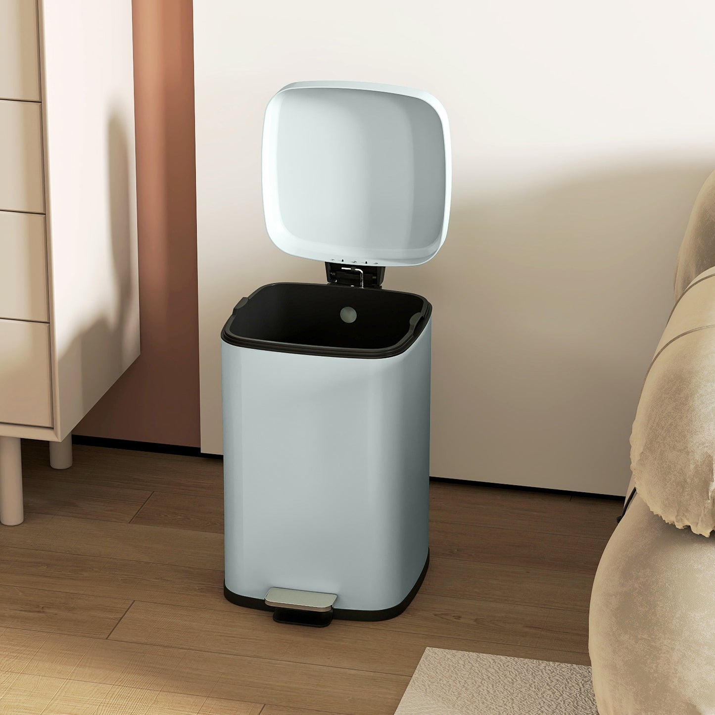 Light green pedal bin with its lid open and black interior bucket.