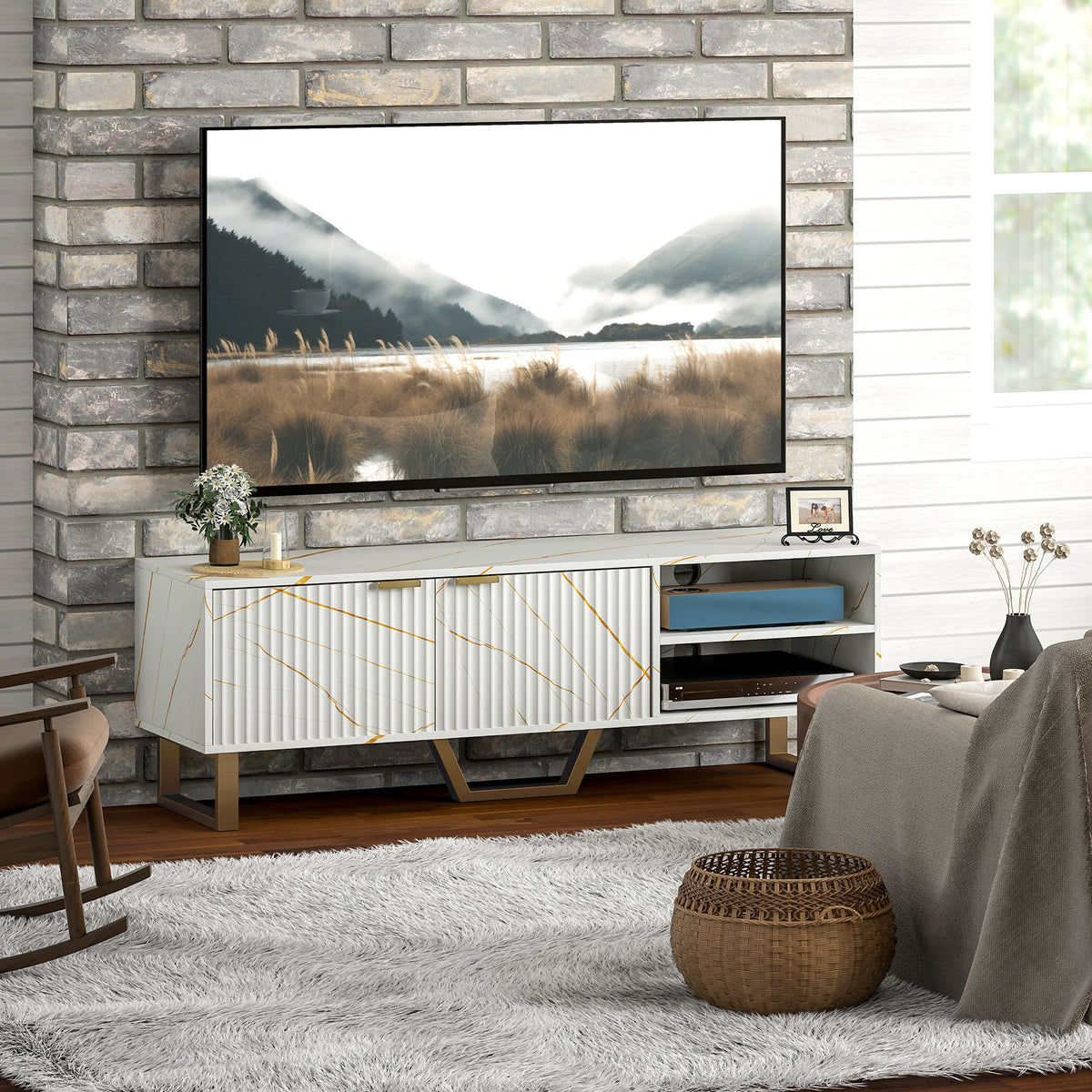 White marble-effect TV stand with fluted doors, open shelves and geometric gold legs