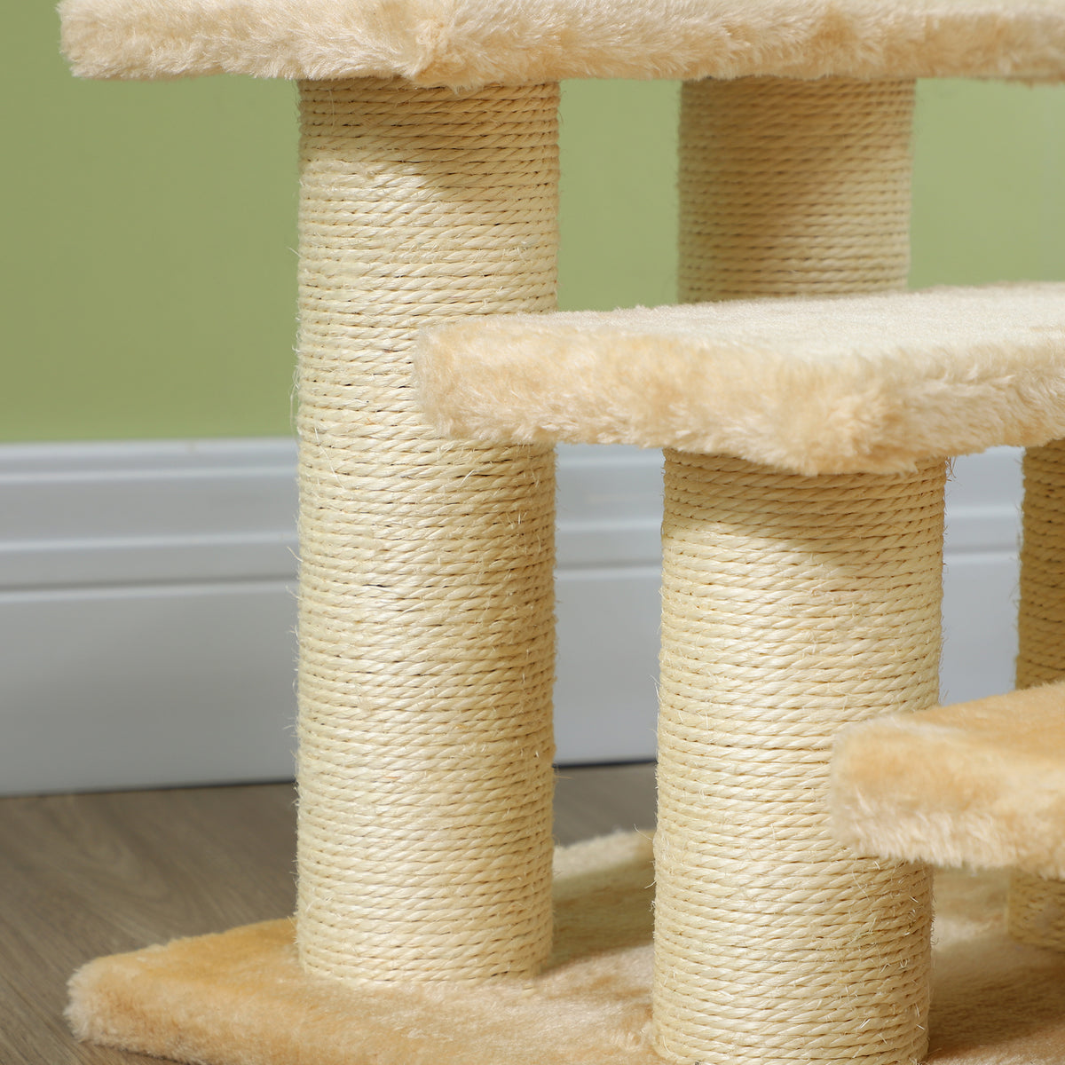 Close-up of sisal-wrapped posts and plush platforms on the three-step pet stairs