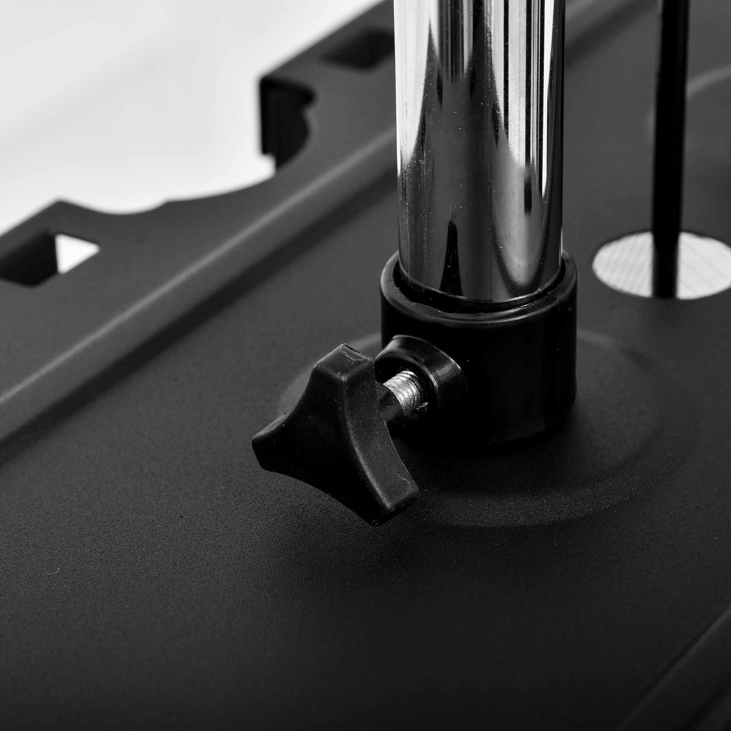 Home gym system close-up of a star-shaped adjustment knob on the steel frame