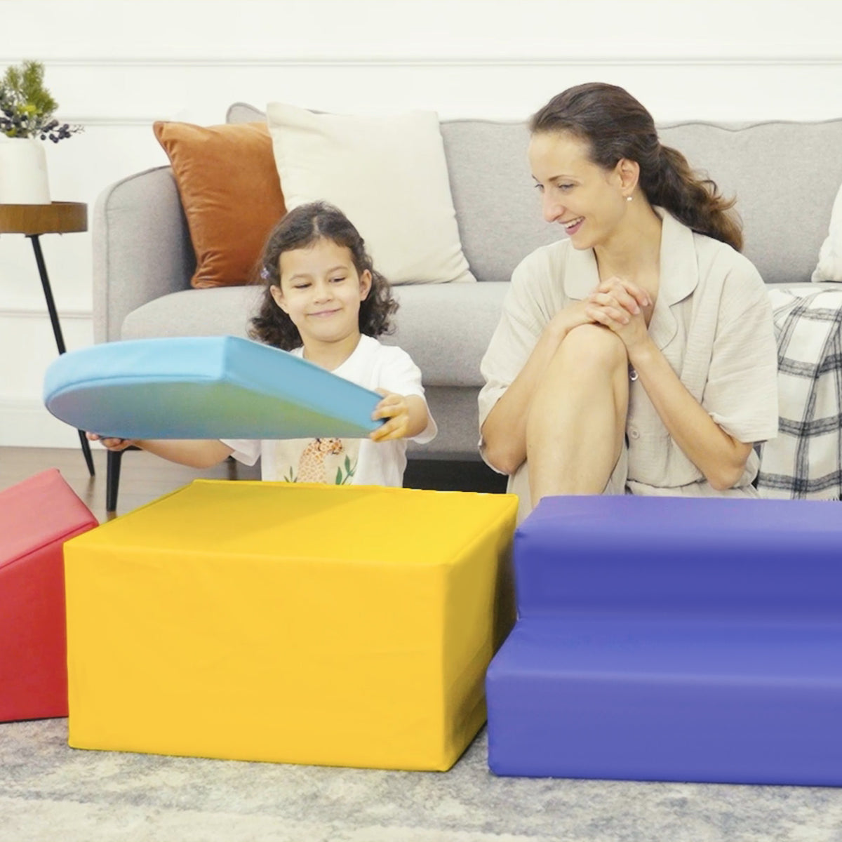 HOMCOM foam play set with yellow block, blue steps, red ramp and removable curved blue piece