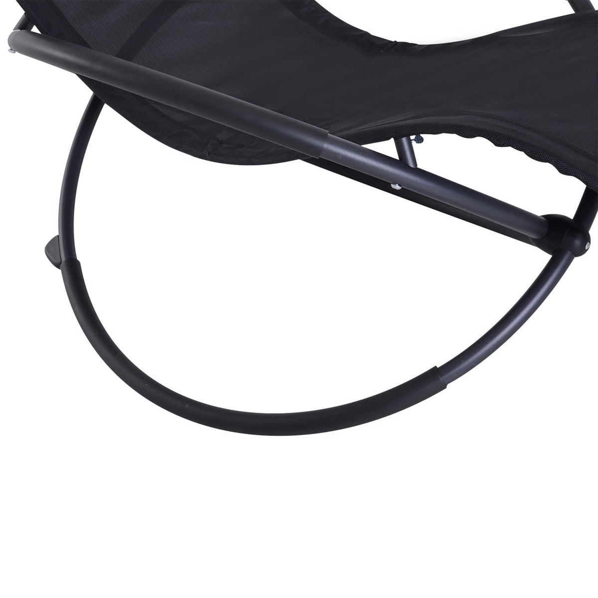 Close-up of the black chaise's curved metal frame and mesh seat