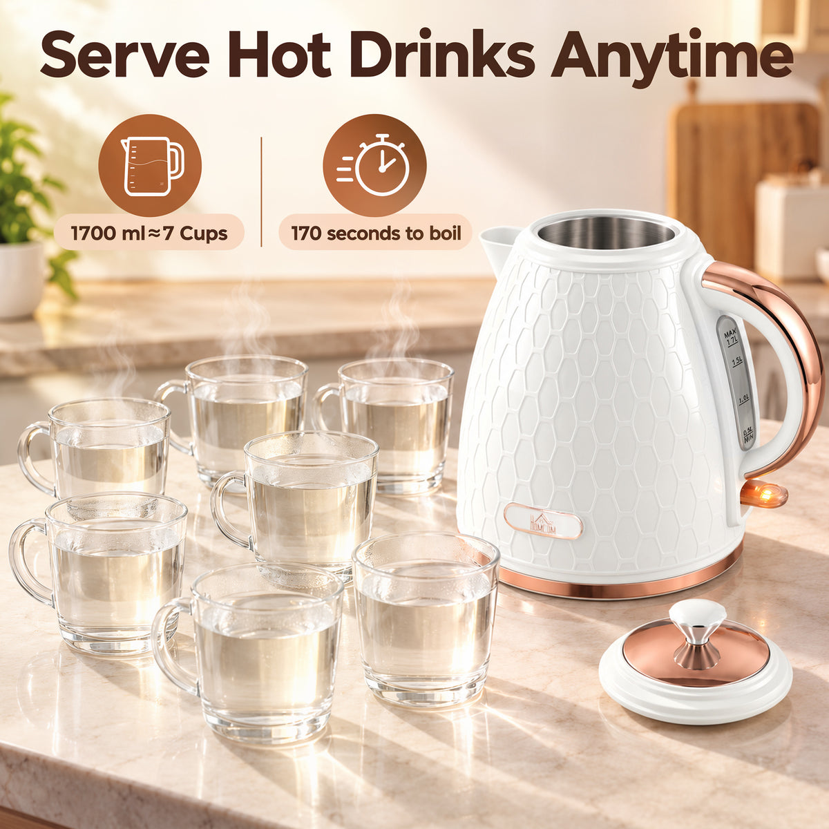 White textured electric kettle with rose gold trim beside clear cups