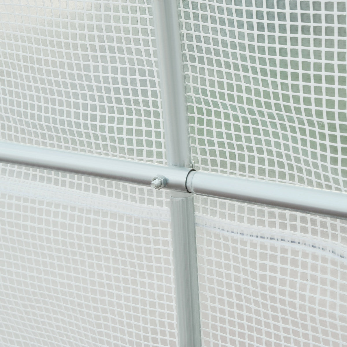 Close-up of white greenhouse mesh cover and joined steel frame tubes