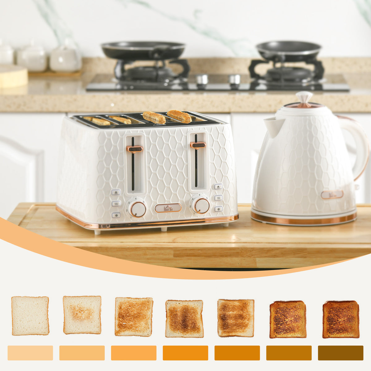 White kettle and four-slice toaster set with rose-gold trim and browning guide