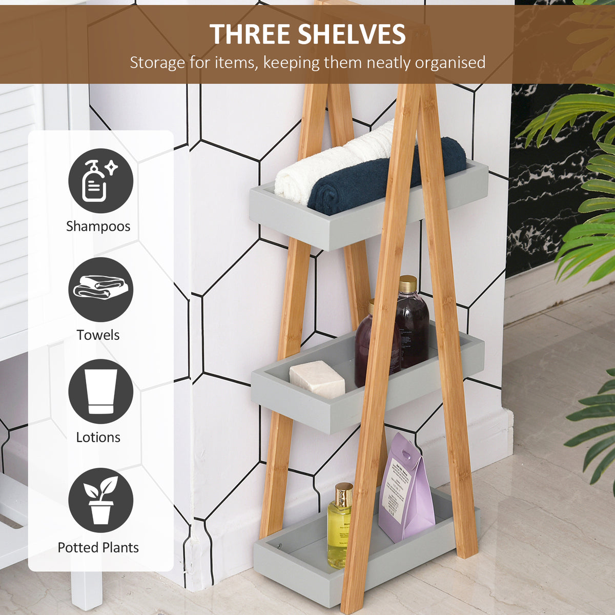 Three-tier bamboo storage shelf with gray trays for toiletries and towels