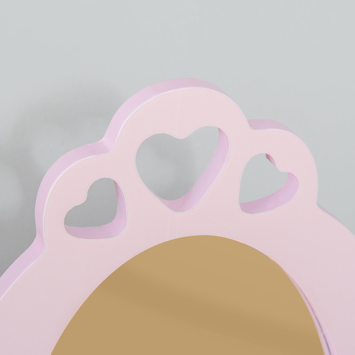Close-up of the vanity mirror frame with heart-shaped cutouts