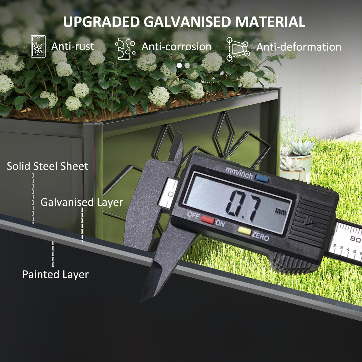 Galvanised steel raised garden bed with diamond-pattern sides and flowers