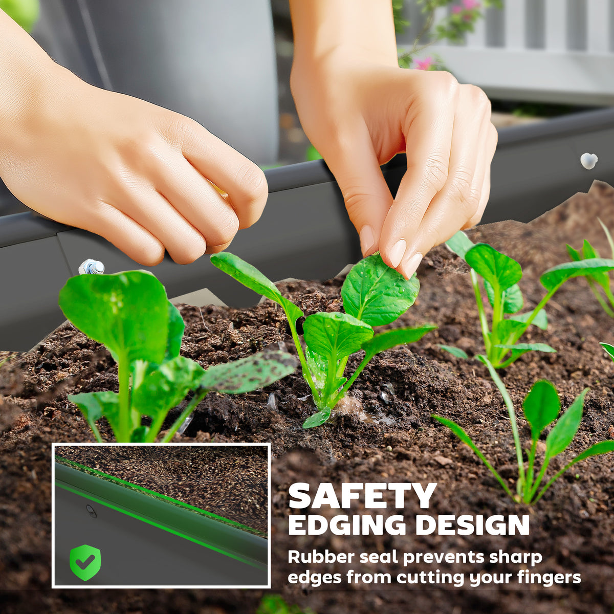 Dark grey steel planter with a rubber safety edge beside seedlings