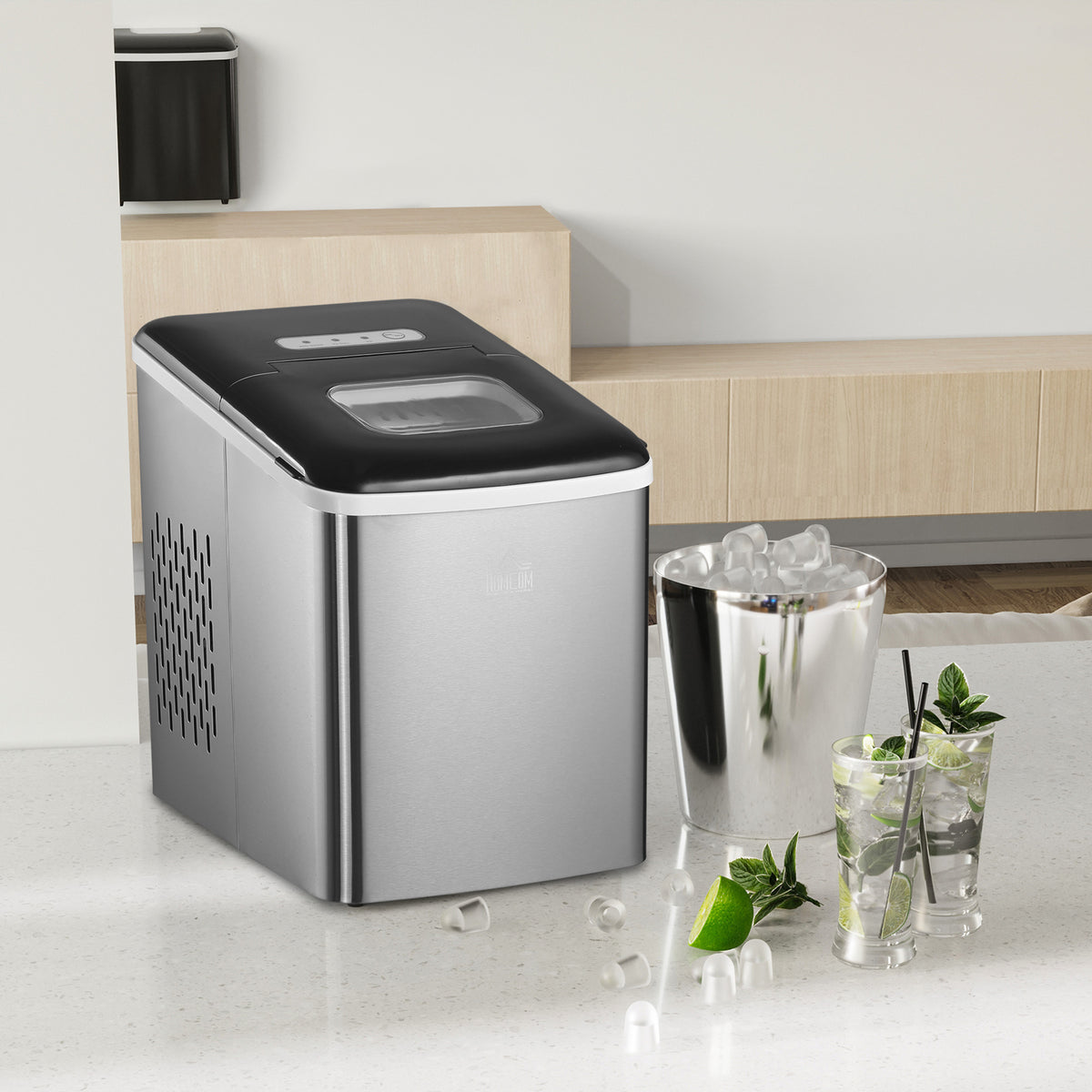 HOMCOM countertop ice maker beside drinks and a bucket of ice