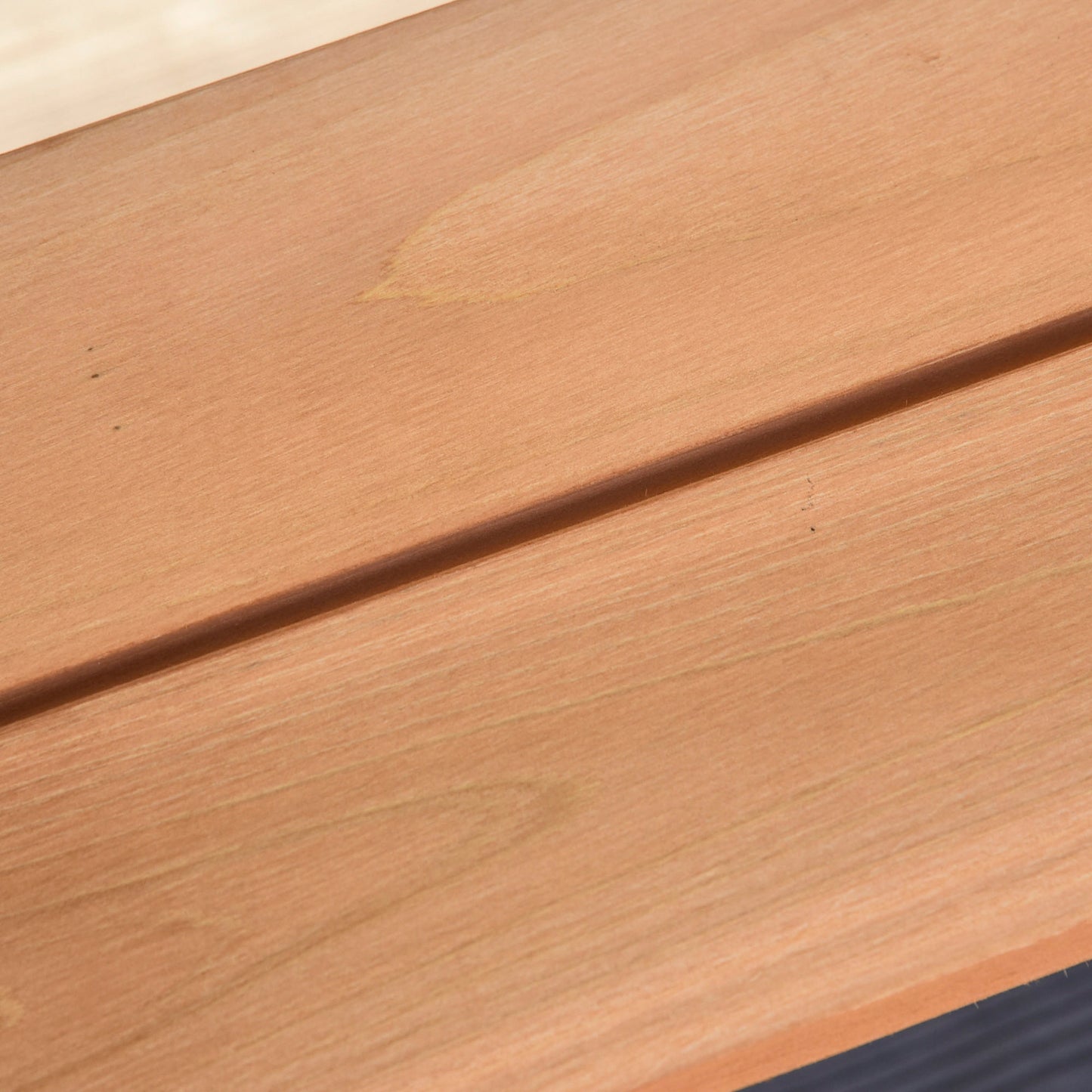 Outsunny picnic table surface showing smooth, warm brown wood grain