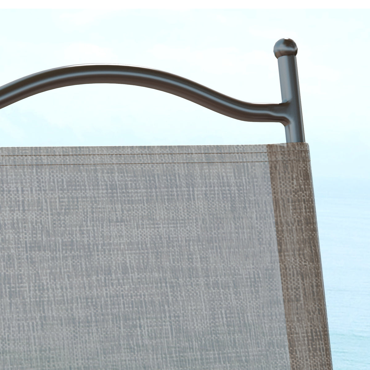 Garden chair close-up showing taupe mesh back and curved dark metal top rail