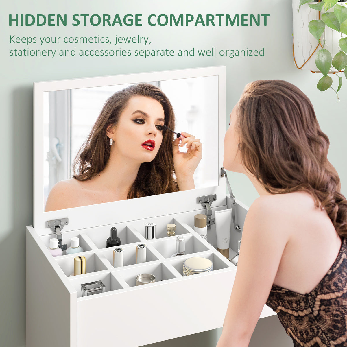 Vanity mirror lifted to reveal divided compartments for cosmetics and jewelry
