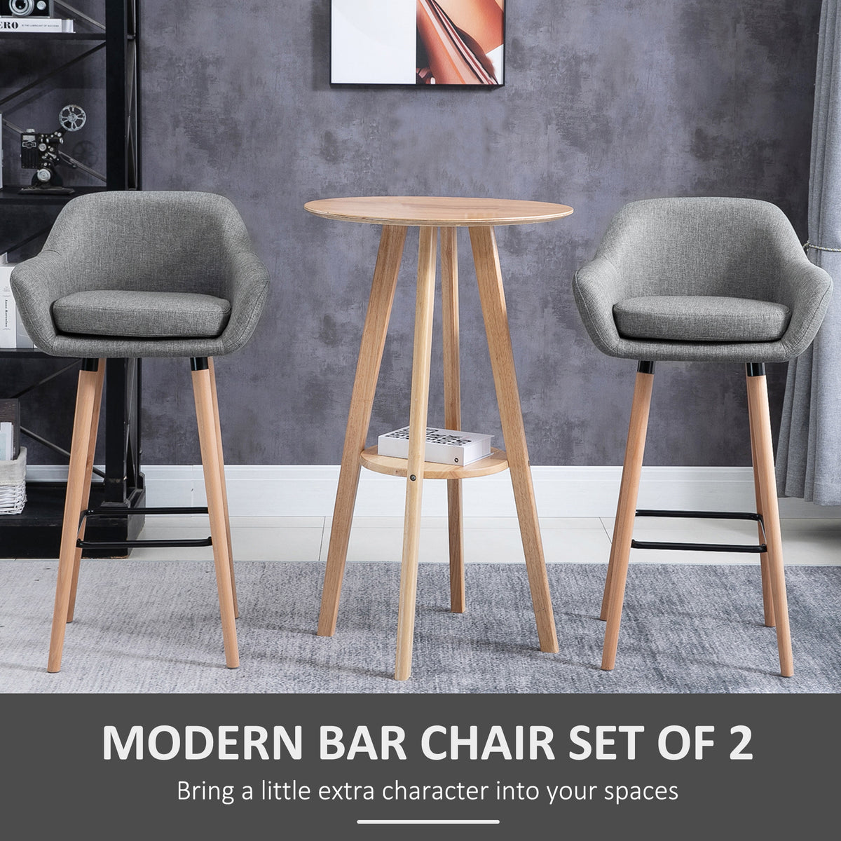 Pair of gray upholstered bar stools with wood legs and black footrests