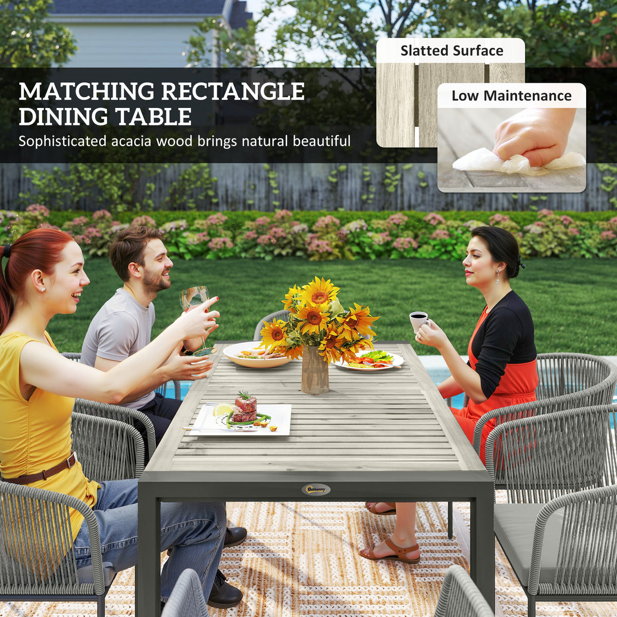 Rectangular acacia wood-top dining table with grey rattan chairs