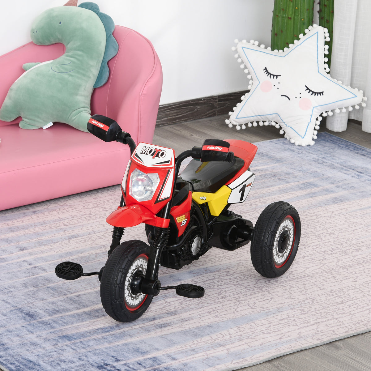 Red toddler ride-on tricycle with black seat, pedals and motorcycle-style decals