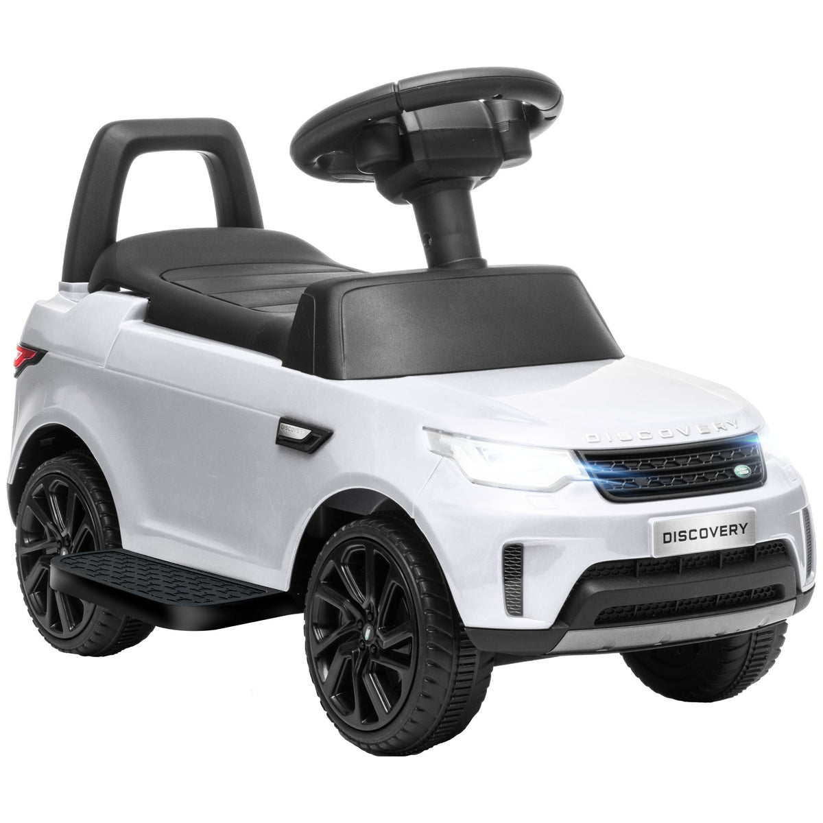 White Land Rover kids' ride-on car with black seat, steering wheel, and chunky wheels