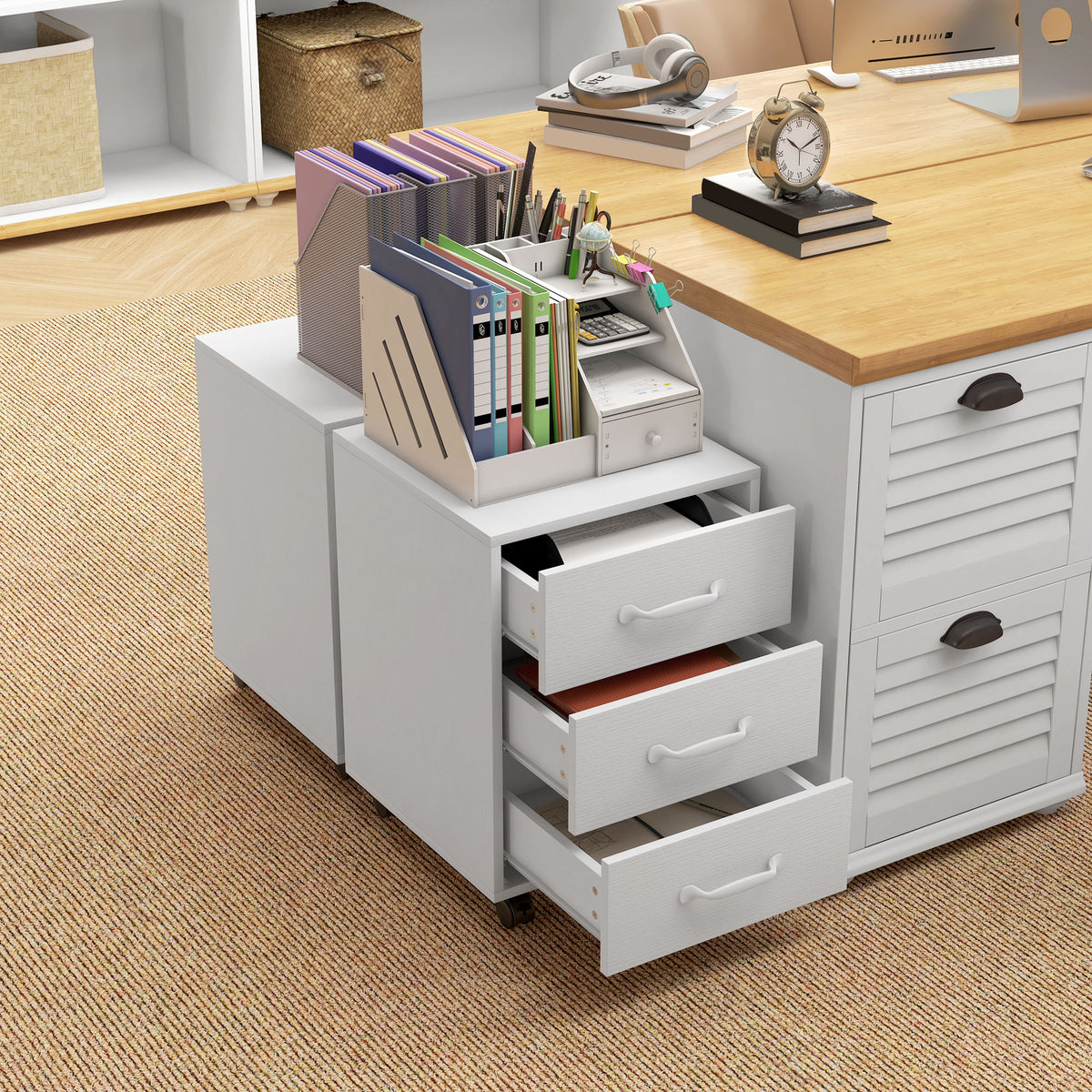 HOMCOM white three-drawer cabinet holding office supplies beside a desk