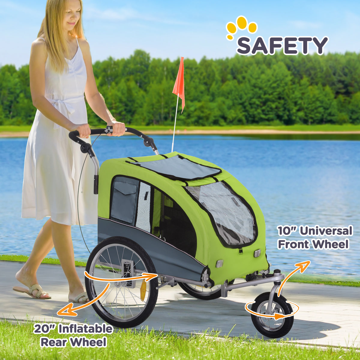 Green dog bike trailer with handle, safety flag, inflatable rear wheels, and swivel front wheel