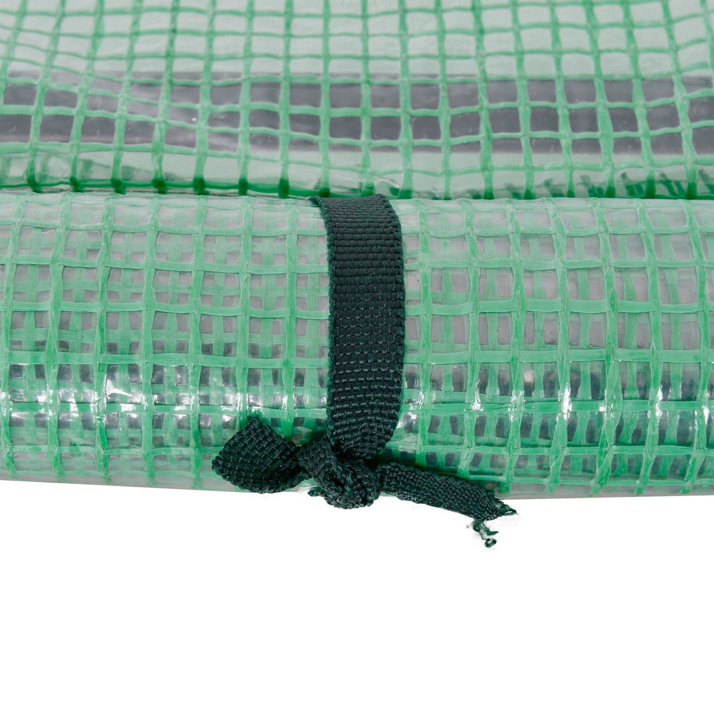 Green tunnel greenhouse cover secured with a black fastening strap