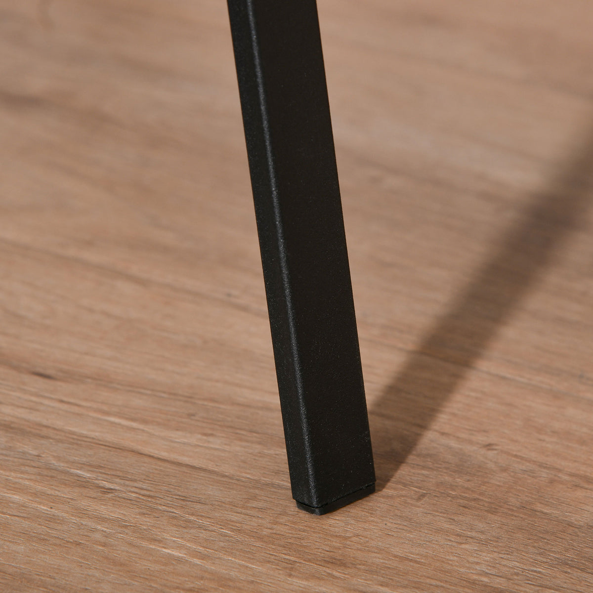 Close-up of the coat rack leg with a protective foot pad