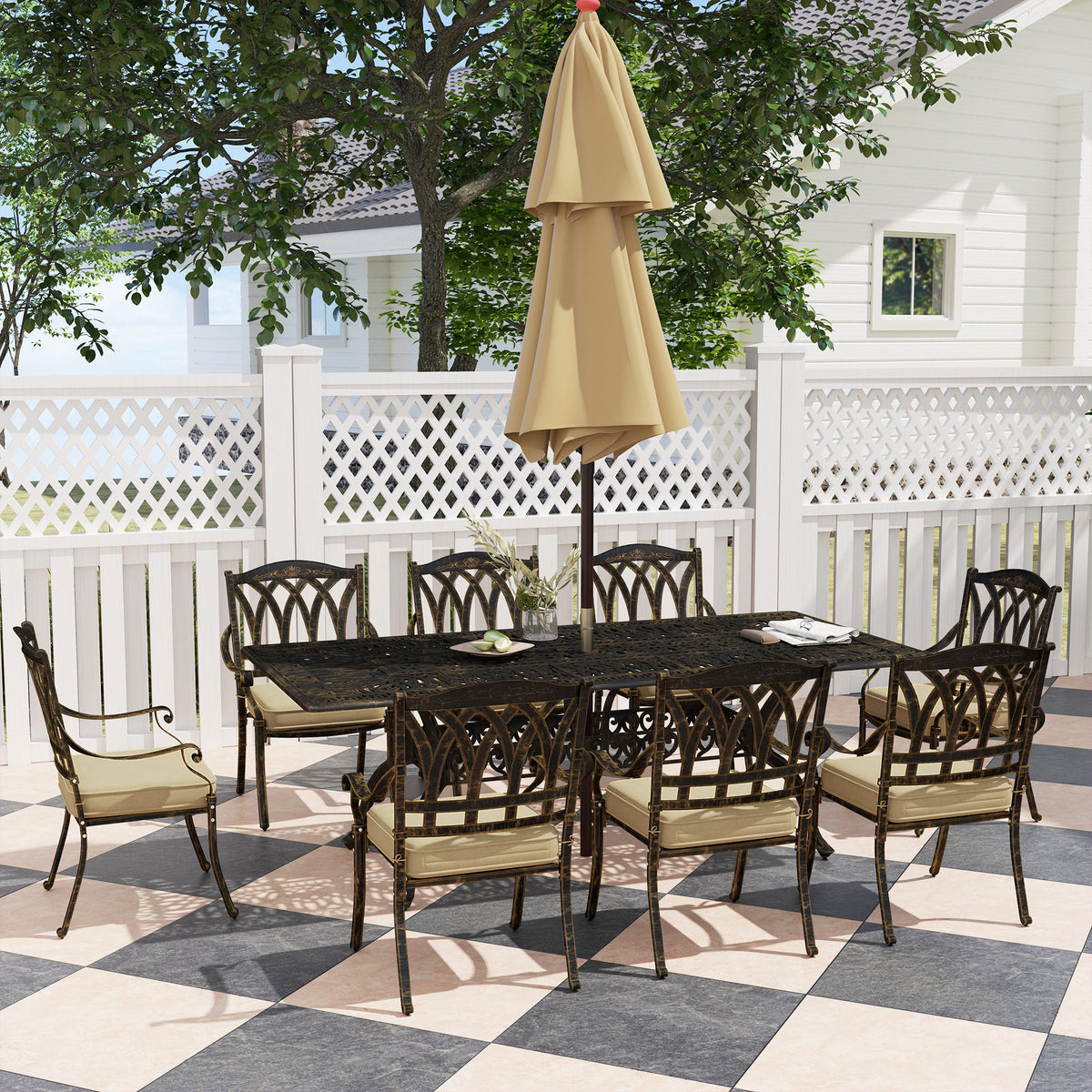 Bronze-tone garden dining set with eight cushioned chairs and a rectangular ornate table