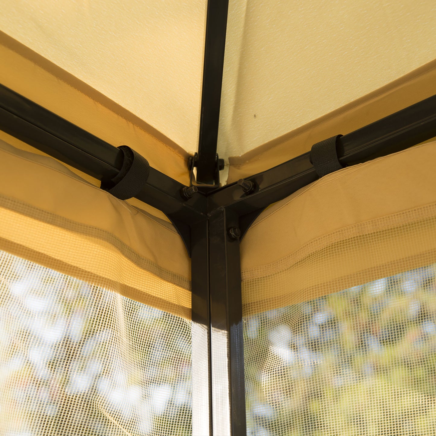 Close-up of gazebo roof corner, steel supports and mesh curtain