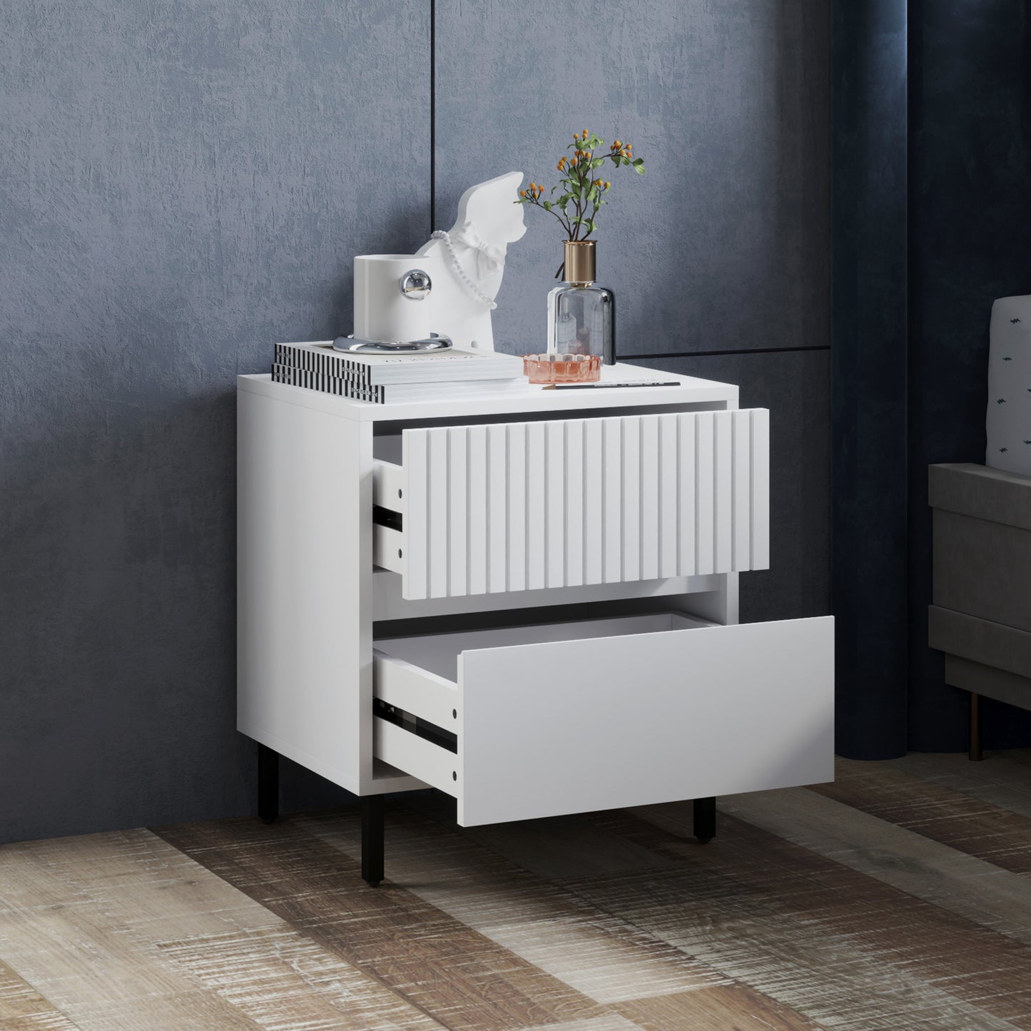 White bedside table with two drawers pulled open on sliding rails