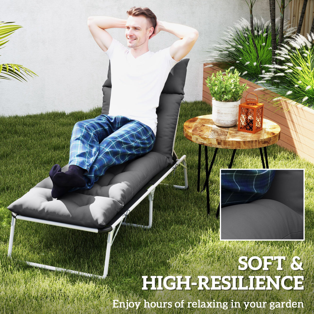 Dark grey tufted lounger cushion fitted to a reclining garden chair