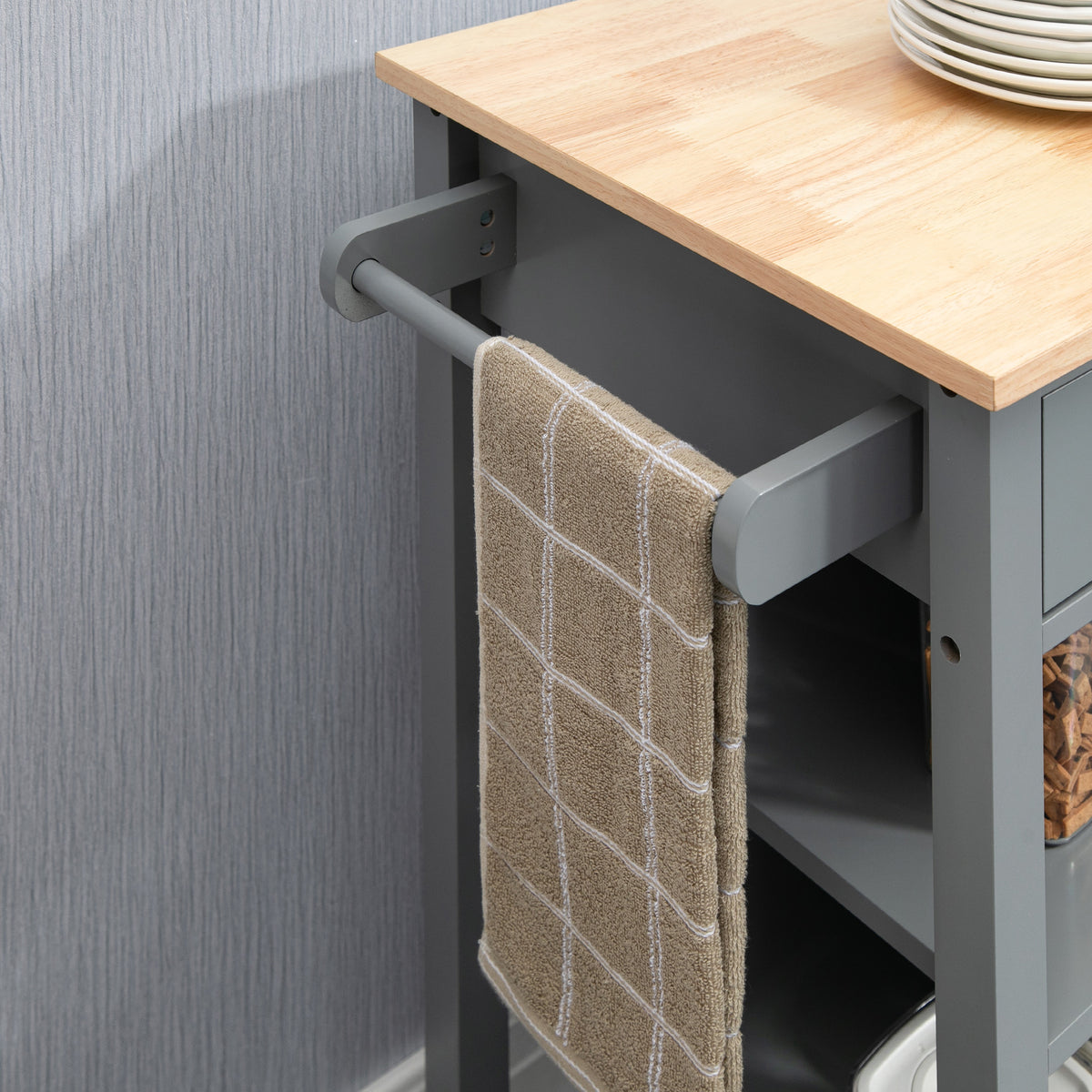 Grey kitchen trolley side towel rail holding a towel beside its wood top