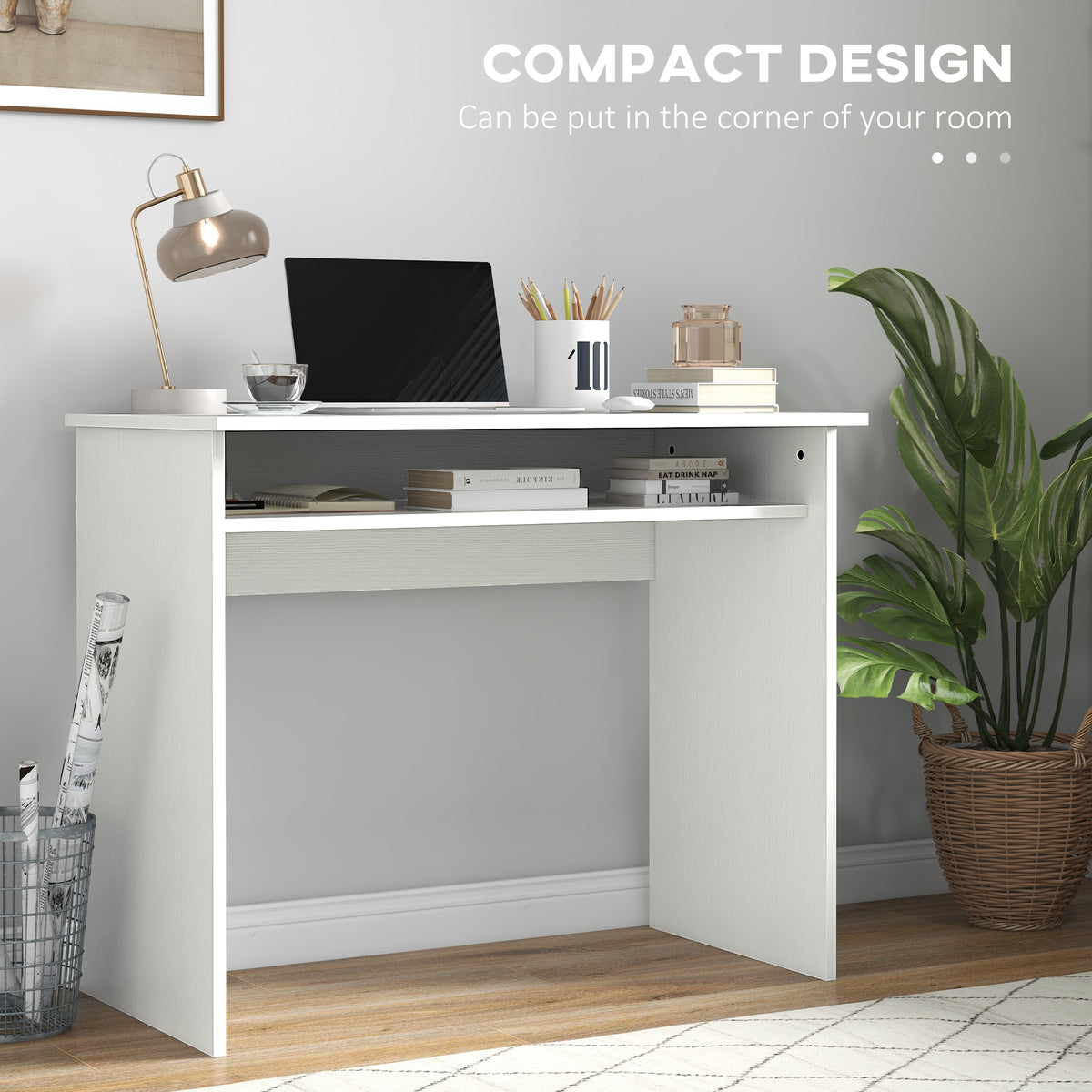 HOMCOM compact white writing desk with storage shelf, shown in a home office