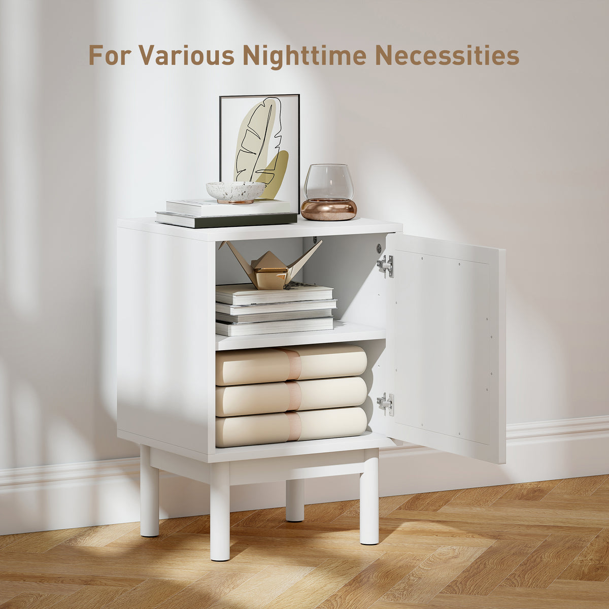 Open white bedside table showing two storage shelves behind its door
