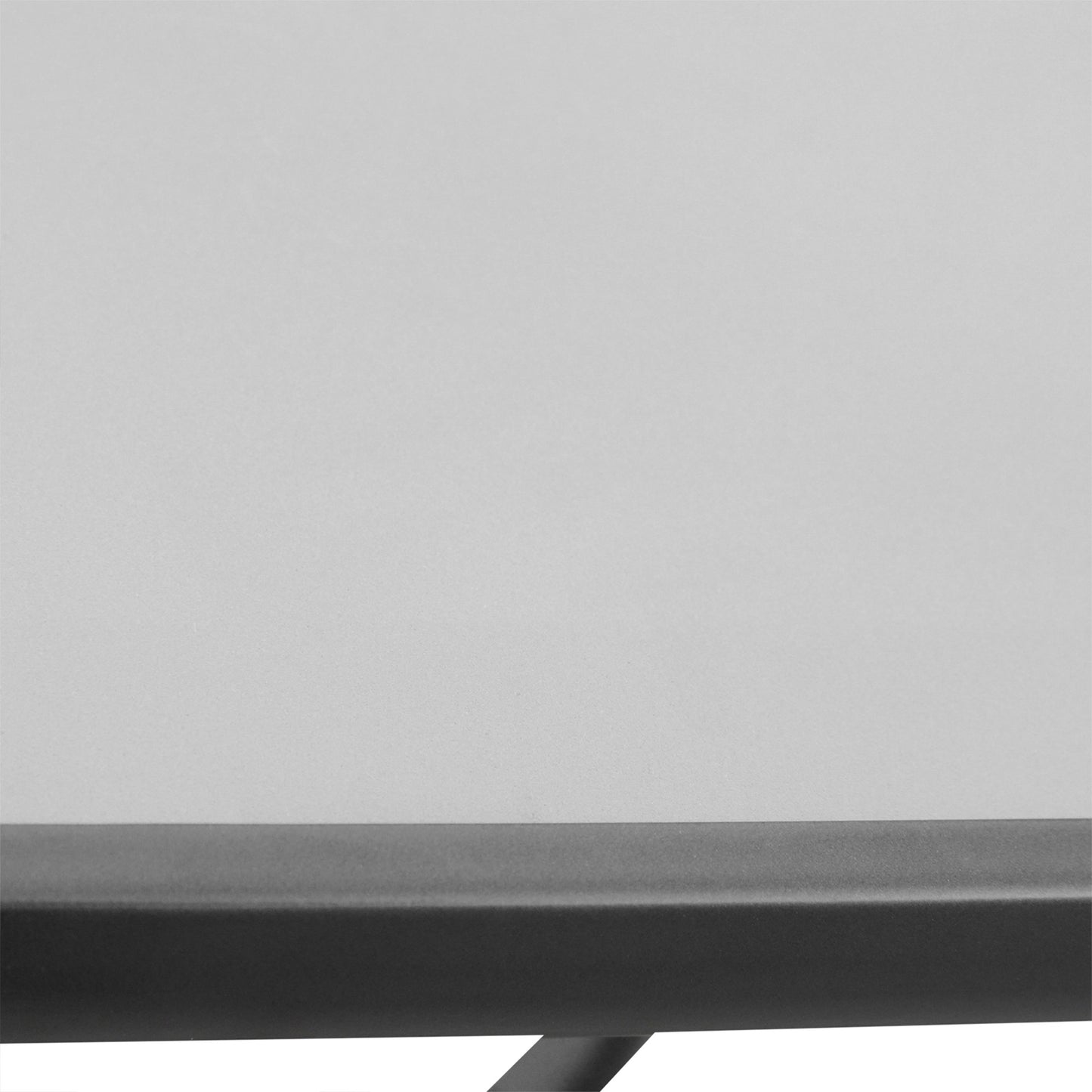 Outsunny table detail showing the thick glass top and dark metal edge rim