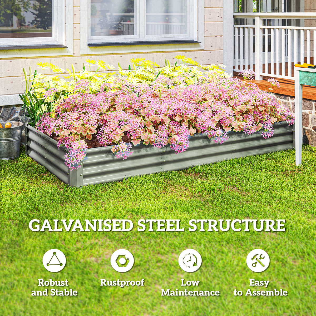Galvanized steel raised planter filled with flowering plants