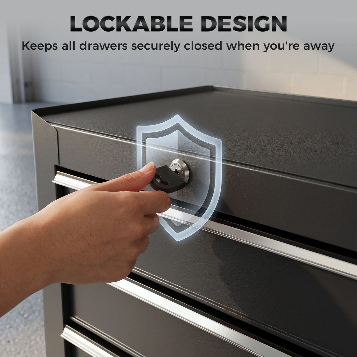 Black HOMCOM tool chest with a key locking its drawers