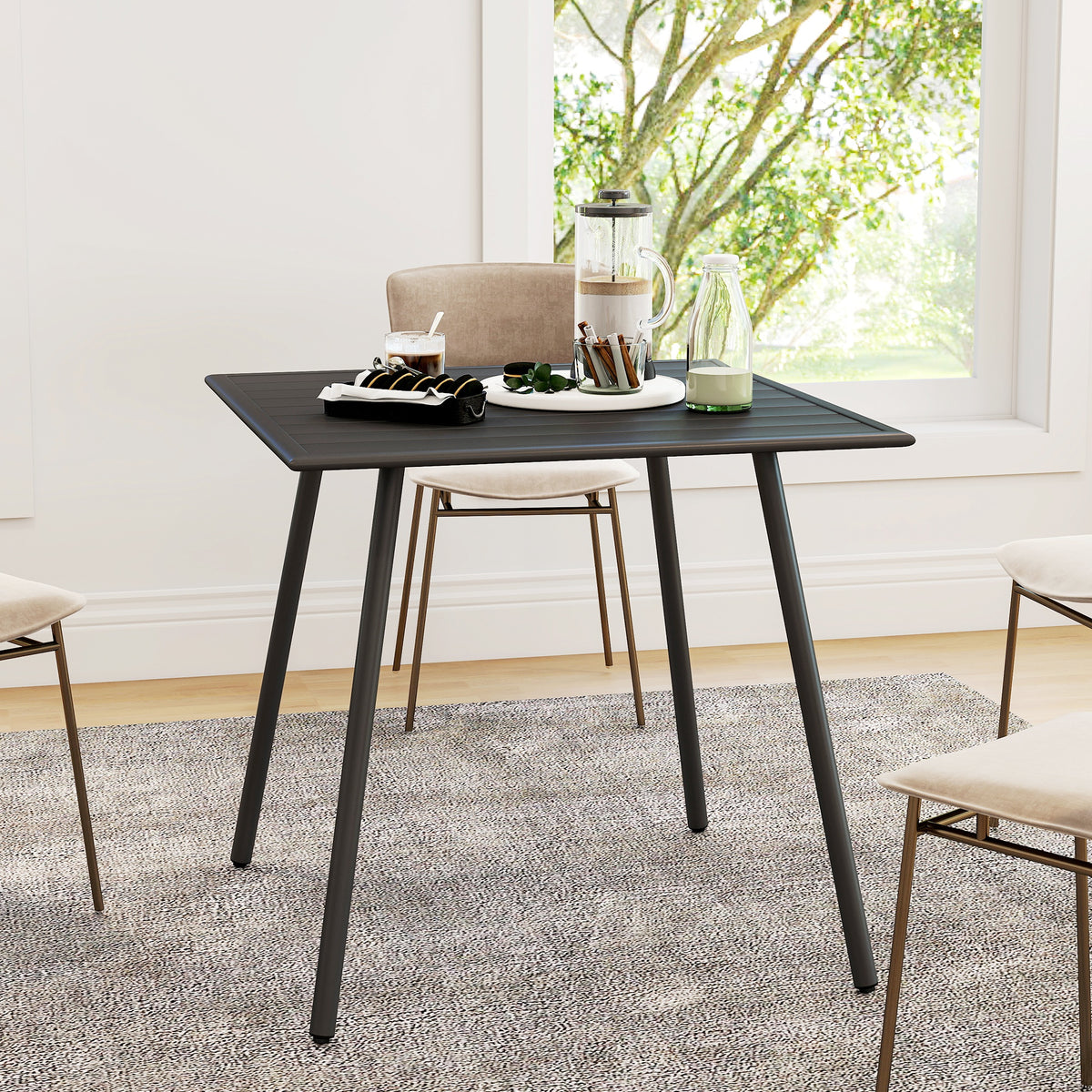 Outsunny black square table with slatted top, shown set for dining