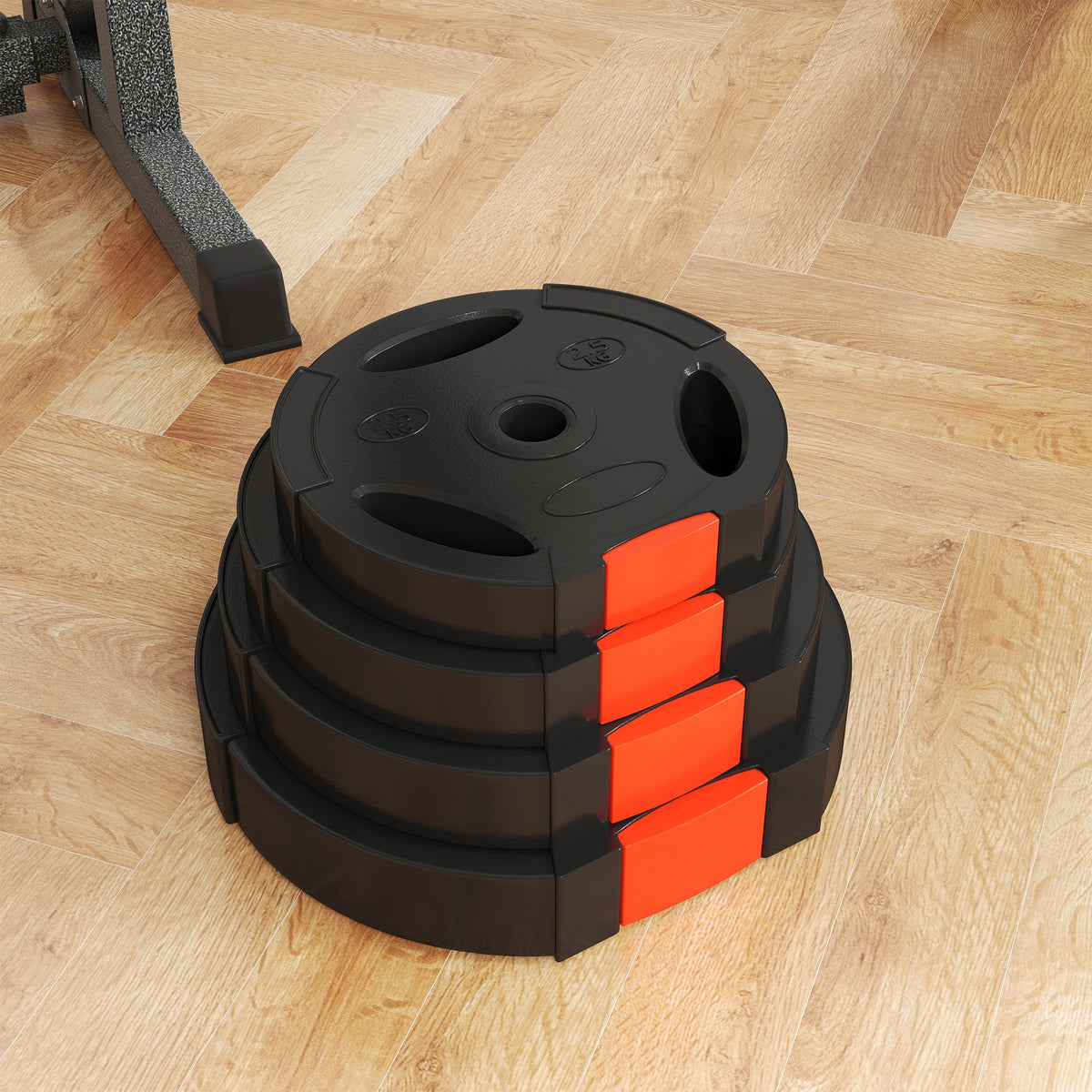 Stacked black SPORTNOW weight plates with red side accents and grip holes
