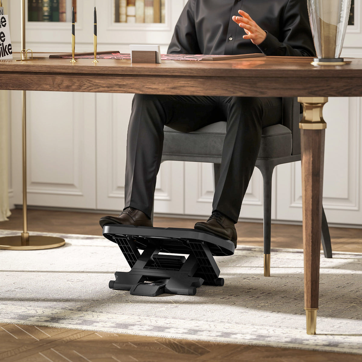 HOMCOM footrest supporting a seated person's feet under a desk