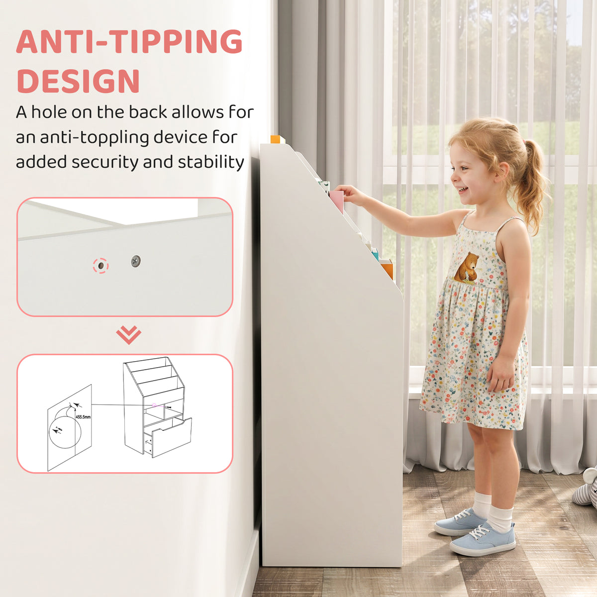 Side view of the white kids' bookshelf, showing its sloped book shelves and anti-tip wall attachment.