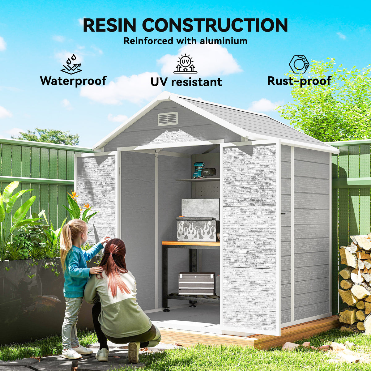 Light gray resin garden shed with open doors, interior shelving, window and pitched roof