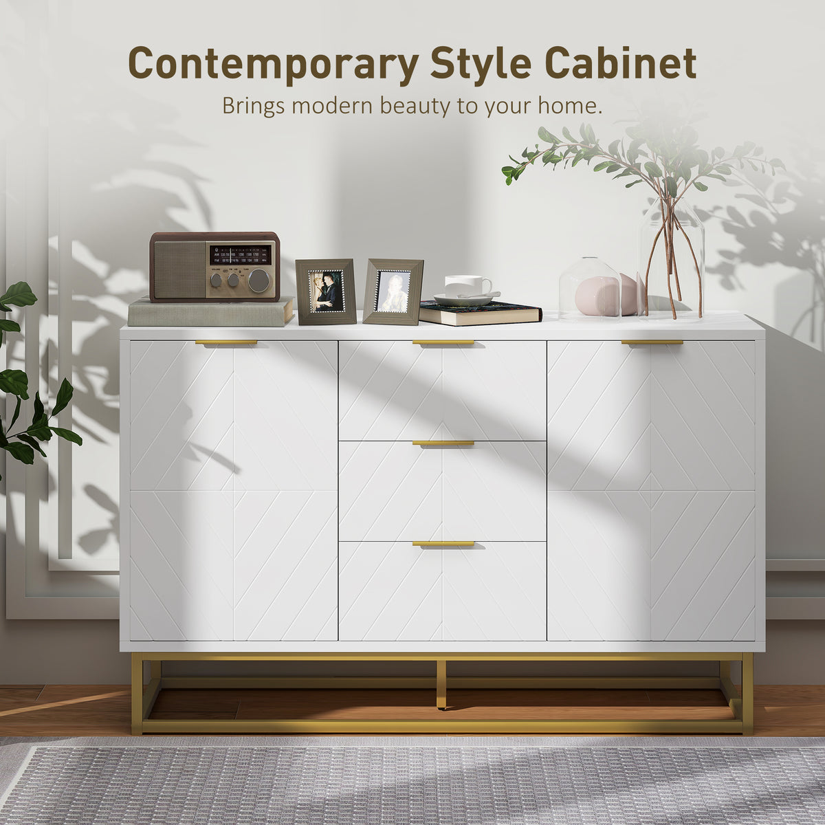 Front view of white sideboard with three drawers, two doors and geometric detailing