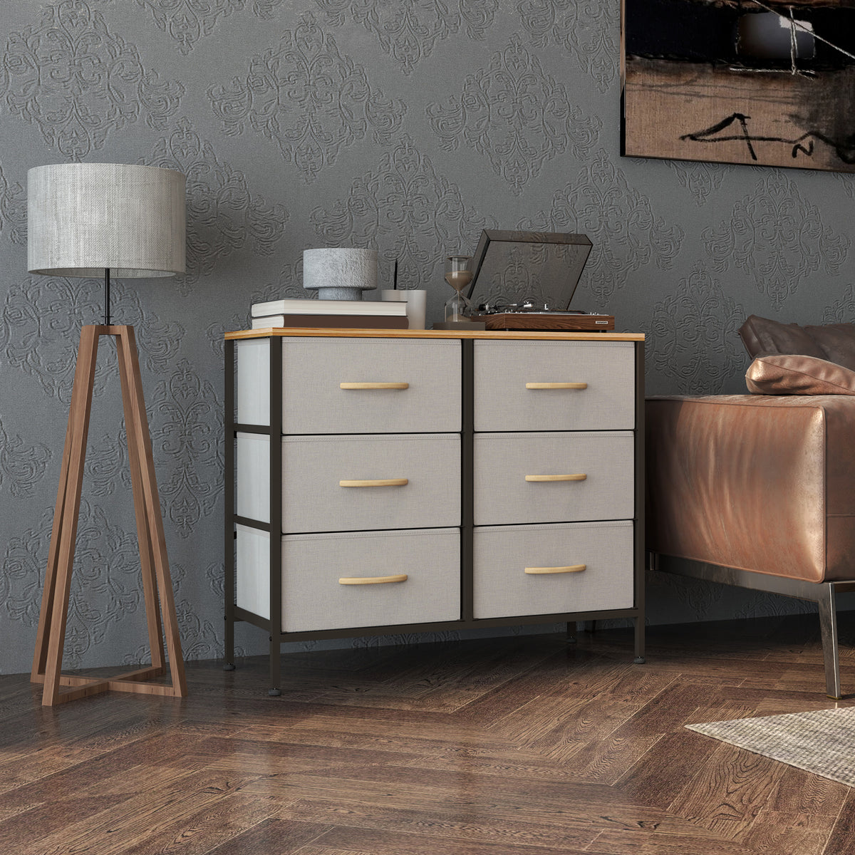 Cream fabric chest of drawers with six drawers and a wood top in a living room