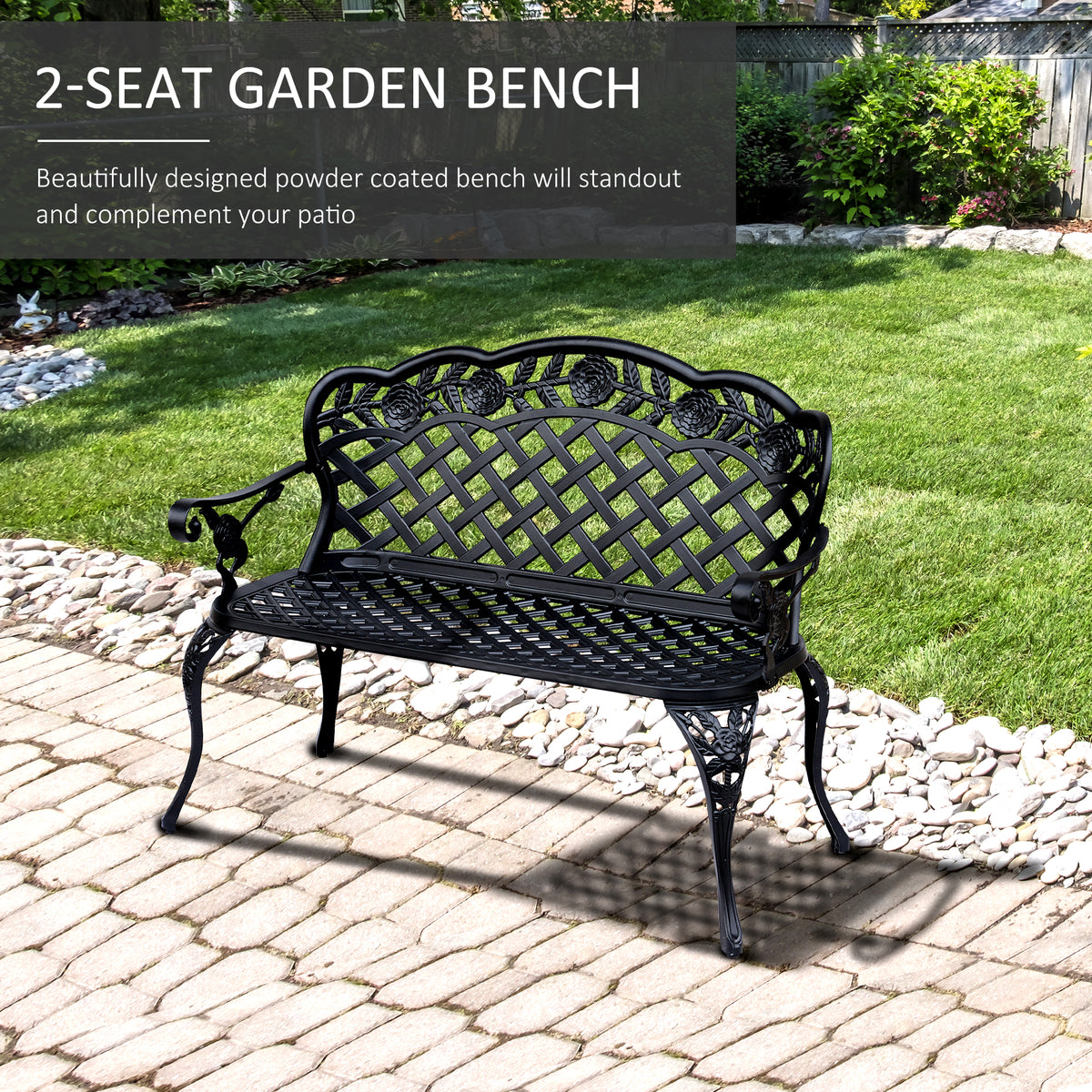 Two-seat black garden bench with floral lattice back on a paved patio