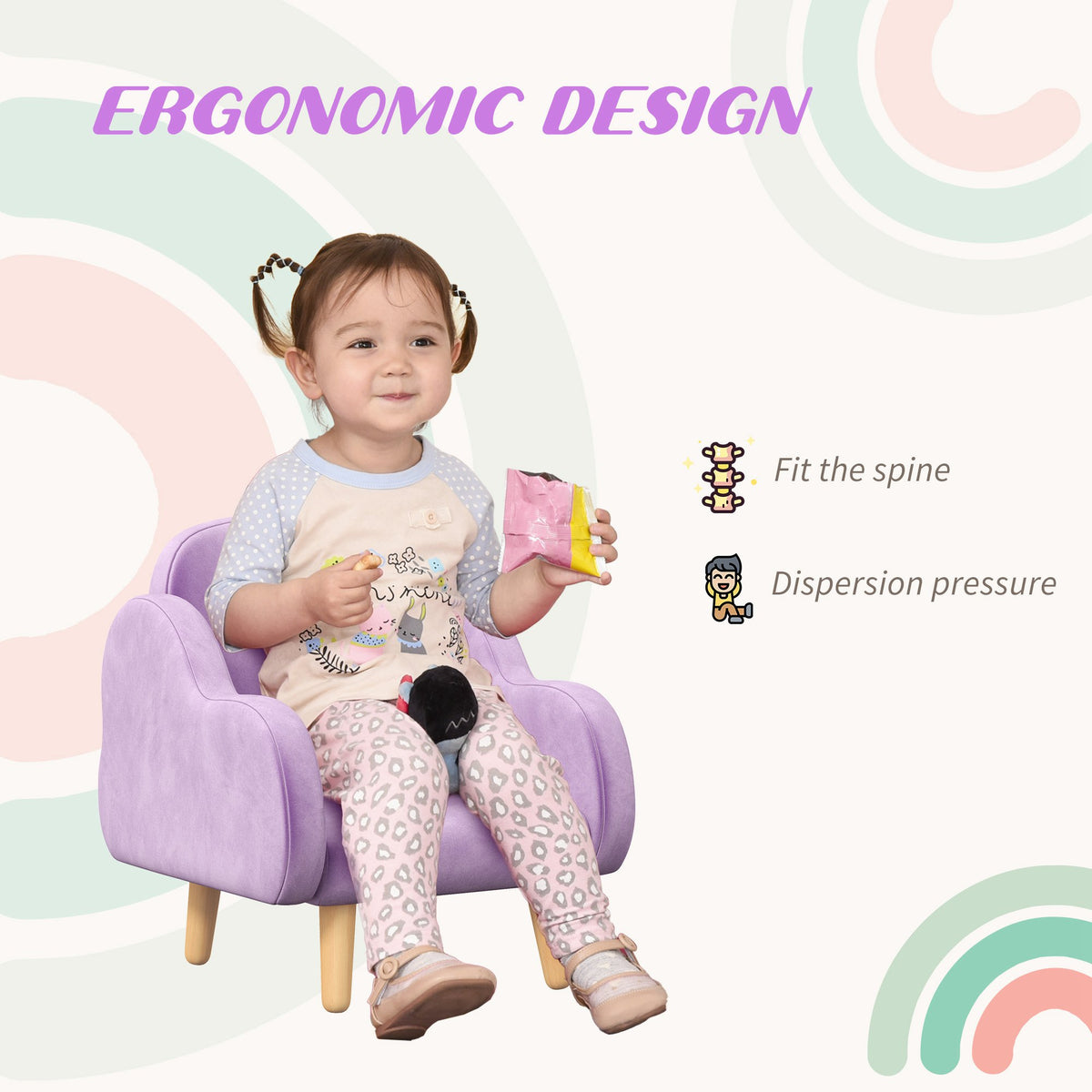 Toddler seated in a purple velvet armchair with padded arms and wood legs