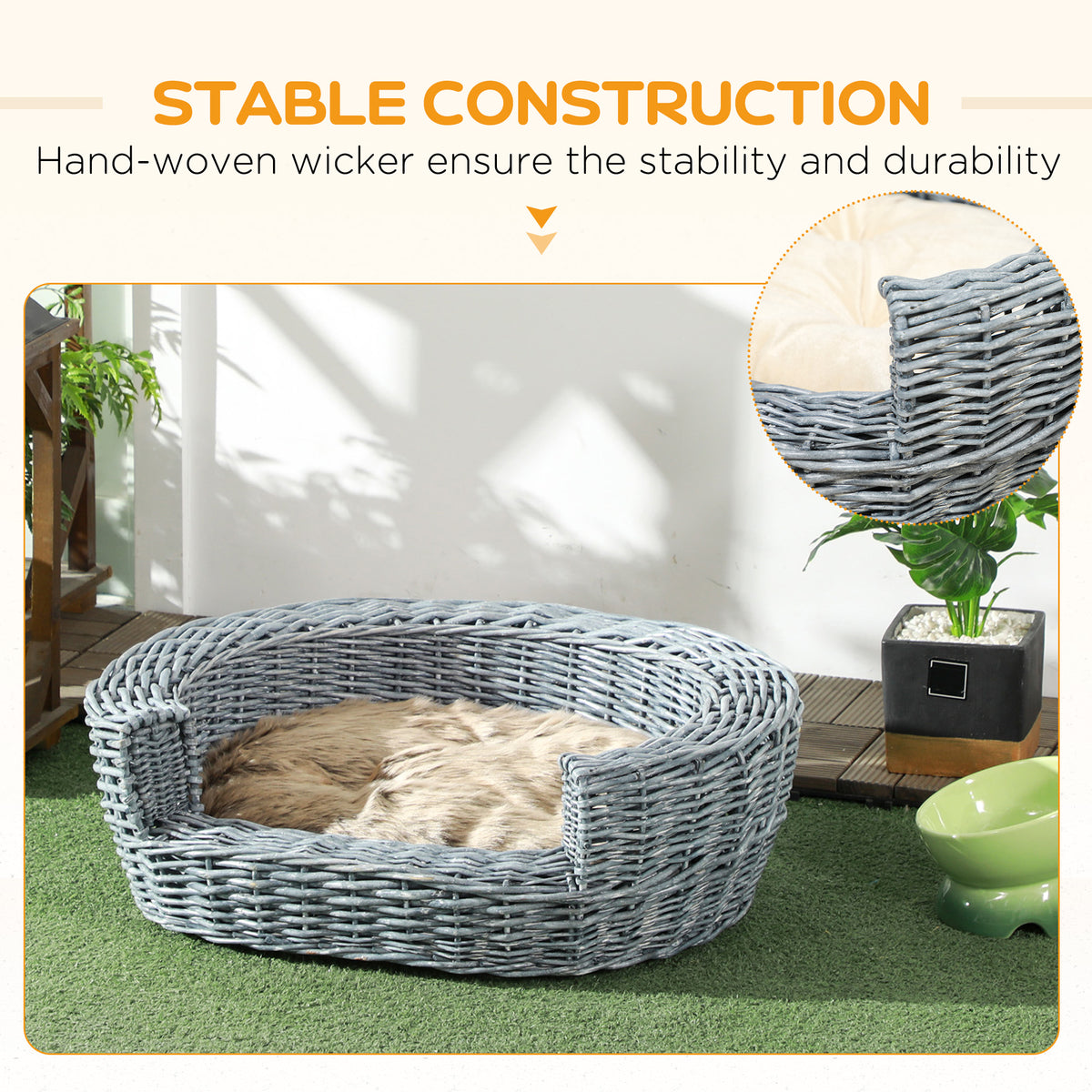 Gray woven wicker pet bed with cushioned interior and raised sides