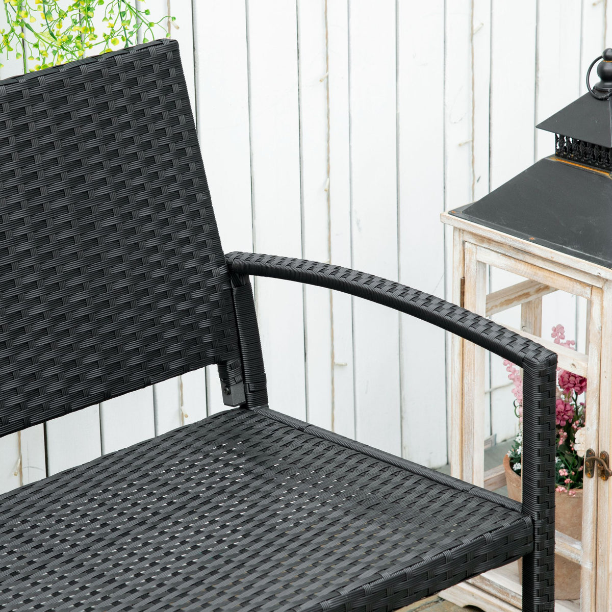 Close-up of the black woven bench seat, backrest and curved armrest