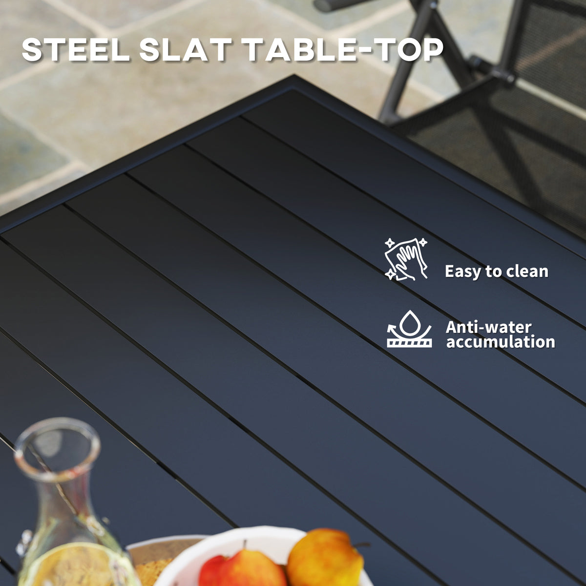 Close-up of the black slatted tabletop and edge of the Outsunny garden table