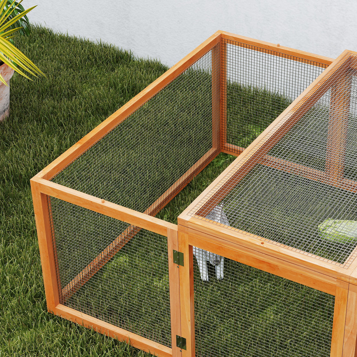 PawHut rabbit run detail showing wooden frame, mesh panels, and door hinges