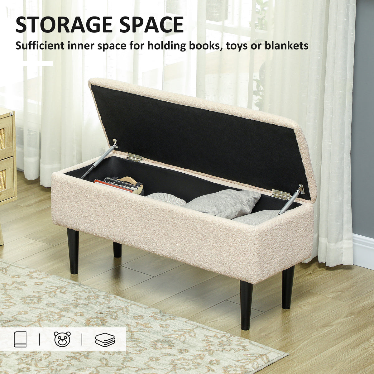Cream storage ottoman with its lid open, showing a roomy compartment and safety hinges